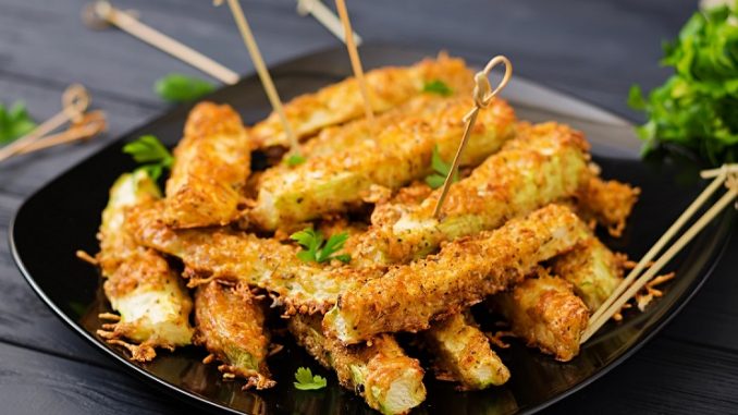 Zucchini slices baked under cheese breading